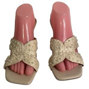 A new day women’s heels. Woven design with pearl color beads. Open toe size 11